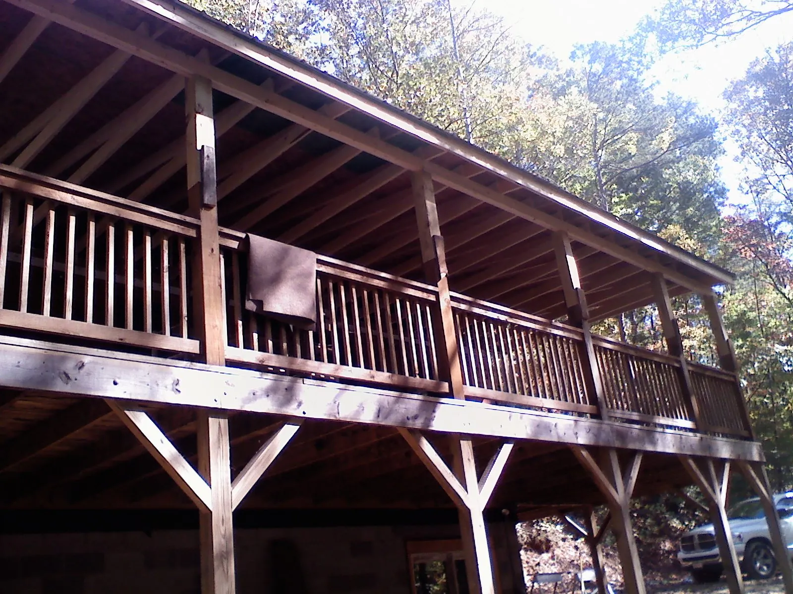 Timber framing under a new elevated porch and deck — Roof Leak Repair in Yucaipa by Roofing Brothers